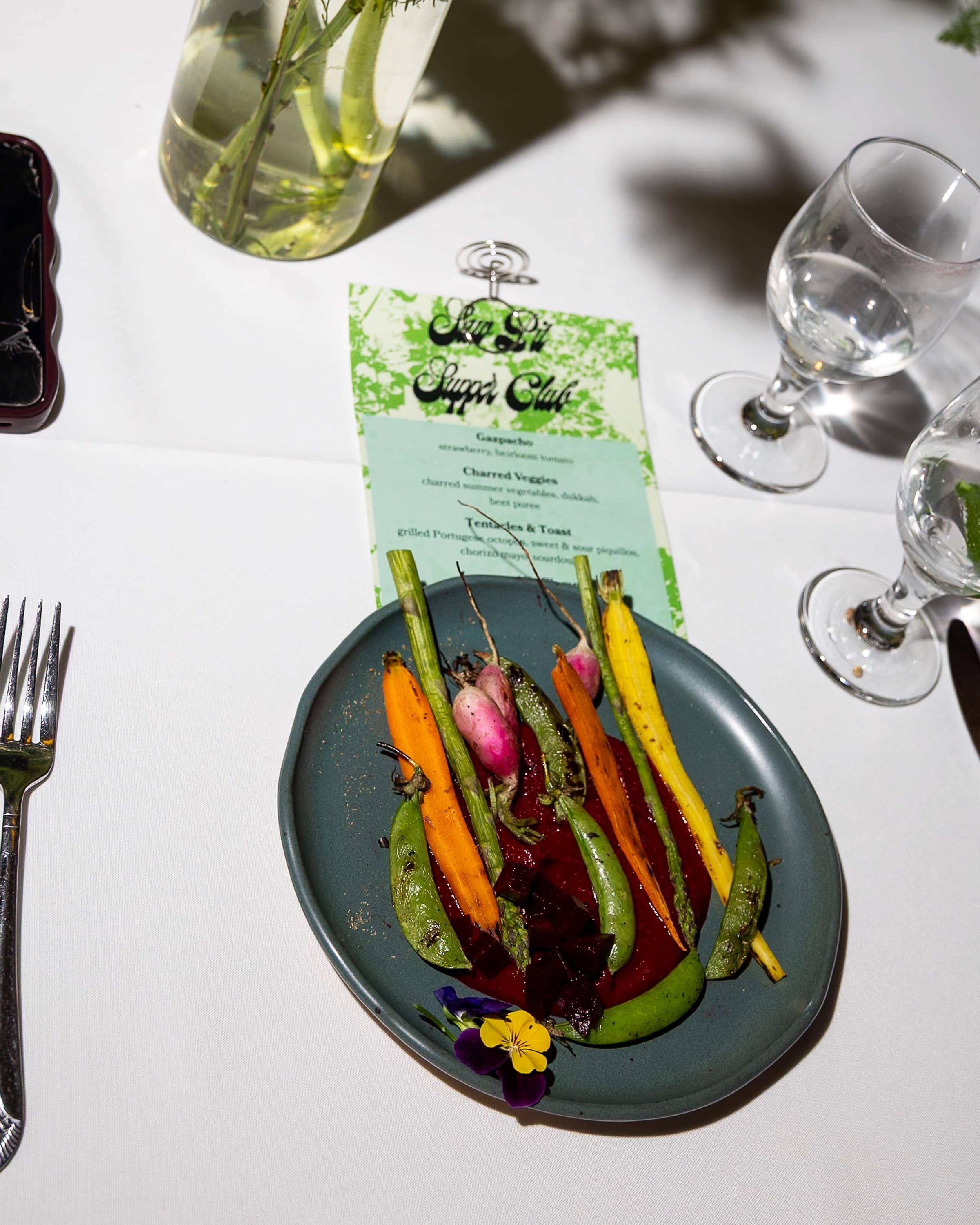 Charred summer vegetables with beet purée